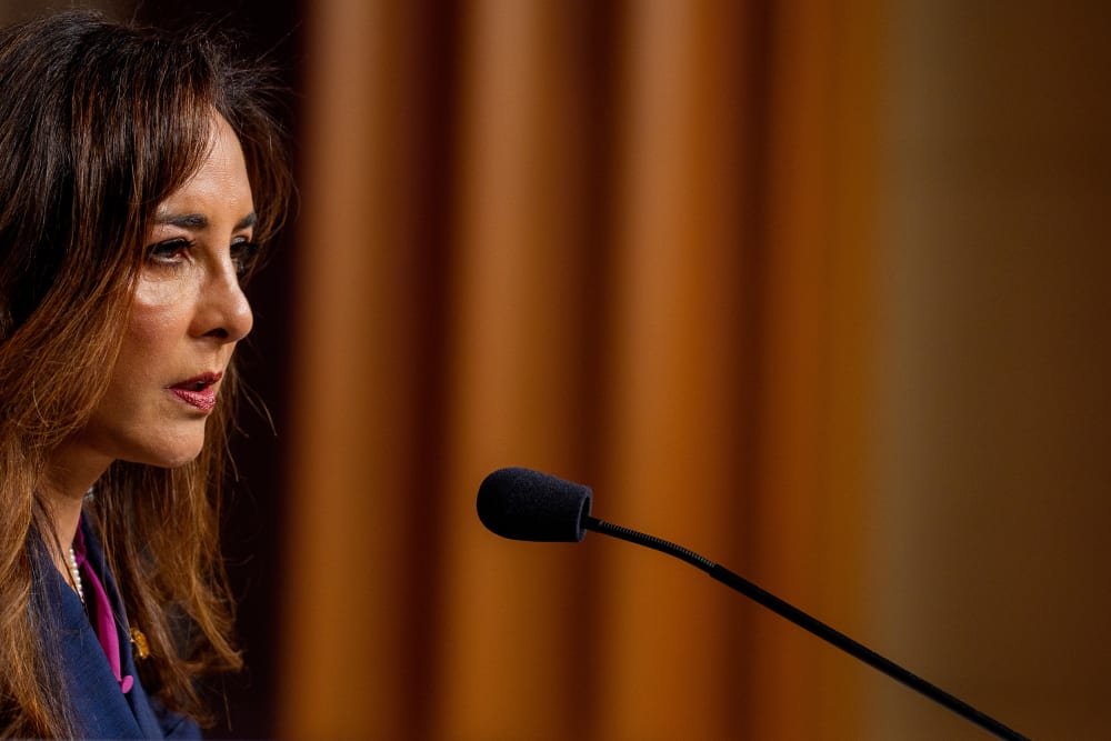 Harmeet Dhillon speaks during a news conference.