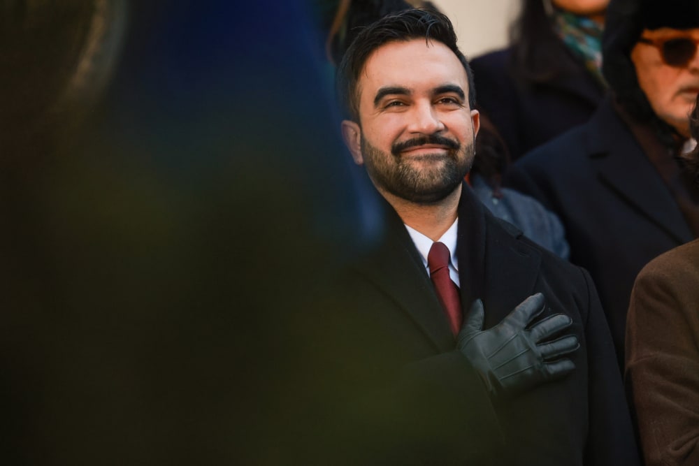 Zohran Mamdani with his hand over his heart at inauguration