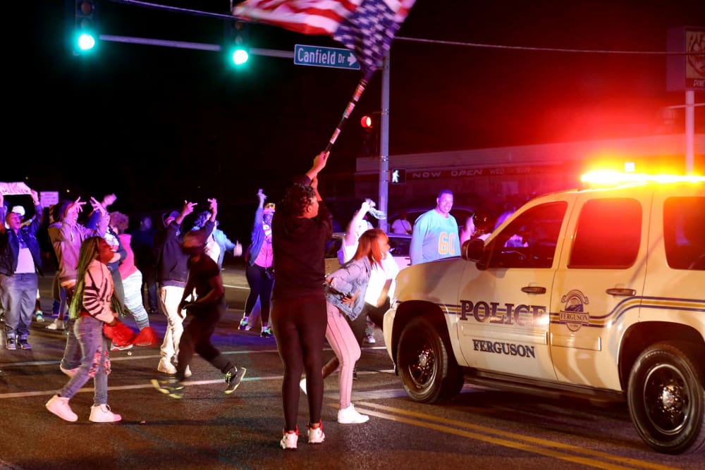 Protesters block the intersection of West Florissant Avenue and Canfield Drive in Ferguson, Mo., Tuesday night, April 28, 2015. (Photo by David Carson/St. Louis Post-Dispatch/AP)