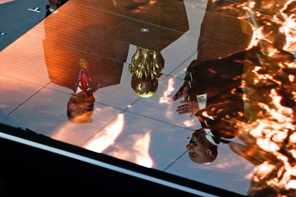 Donald Trump, left, and Gianni Infantino reflected in the floor of the Kennedy Center.