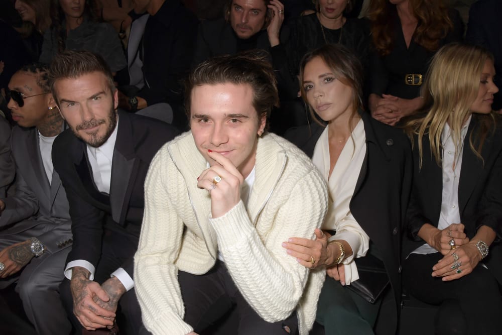 From left, David Beckham, Brooklyn Beckham and Victoria Beckham.