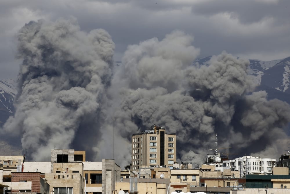 Smoke rises over Tehran, Iran, after a series of explosions on March 01, 2026.