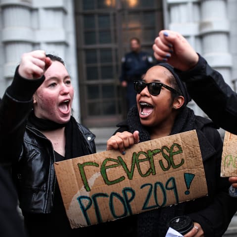 Students hoping for a repeal of California's Proposition 209 hold signs as they protest outside of the Ninth U.S. Circuit Court of Appeals on Feb. 13, 2012 in San Francisco.