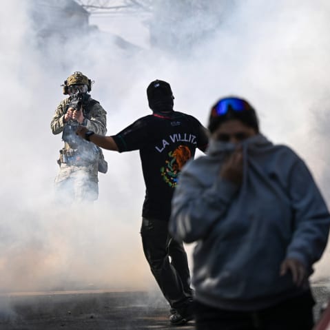 Residents and protesters clash with federal agents in Chicago.