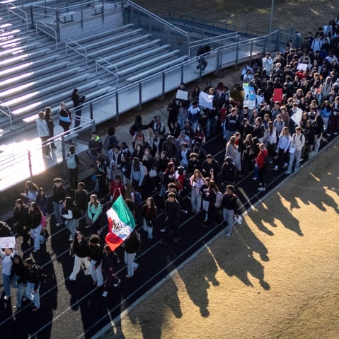 Students walkout at East Mecklenburg High School in Charlotte, North Carolina, in protest of U.S. Border Patrol operations targeting undocumented immigrants.