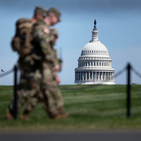 Members of the National Guard patrol the National Mall.