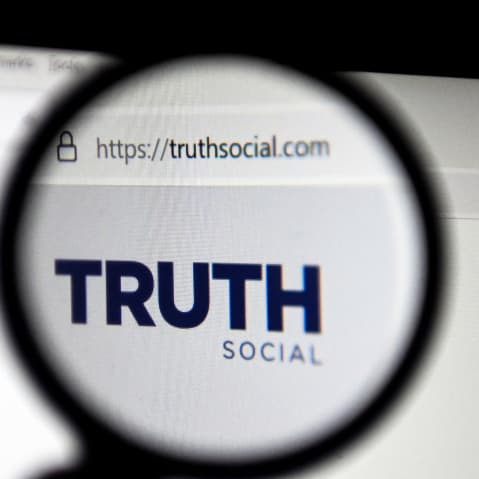 Logo of "Truth Social" on a laptop screen.