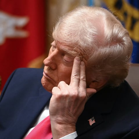 President Donald Trump looks on during a Cabinet meeting in the White House on Dec. 2, 2025.