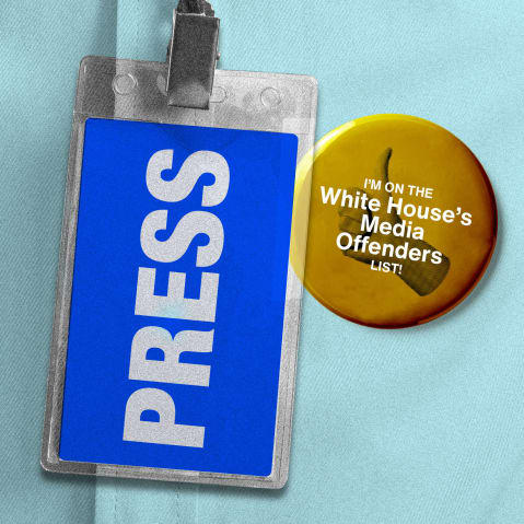 A press pass seen beside a button with a thumb's up that says "I'm on the White House Media Offender's List"