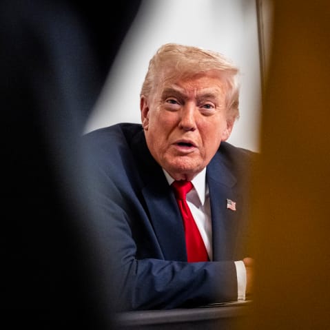 President Donald Trump participates in a call with U.S. service members from his Mar-a-Lago club on Thanksgiving Day on Nov. 27, 2025, in Palm Beach, Florida.