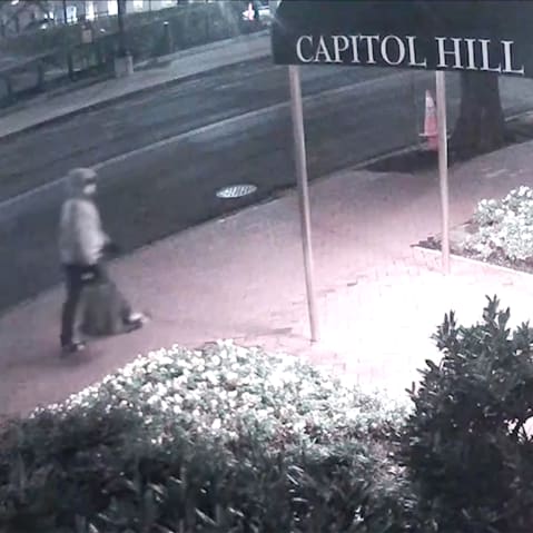 A screengrab of surveillance footage, released by the FBI, of the suspect in the pipe bomb case in the Capitol Hill neighborhood of Washington, D.C.