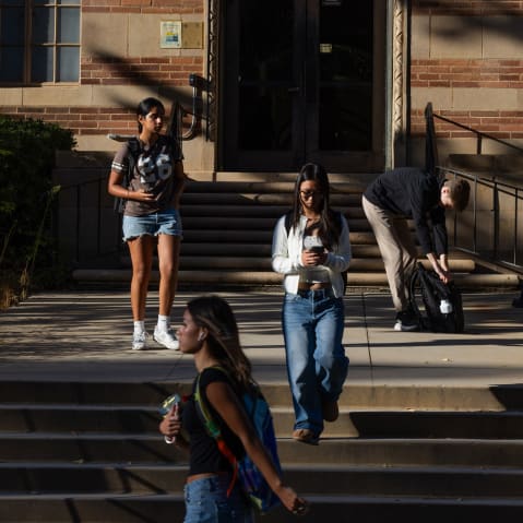 Students walk around the UCLA campus in Los Angeles.