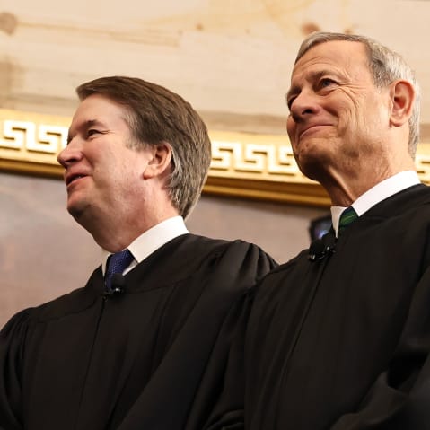 Associate Supreme Court Justices Clarence Thomas and Brett Kavanaugh and Supreme Court Chief Justice John Roberts during Donald Trump's inauguration in the Capitol.