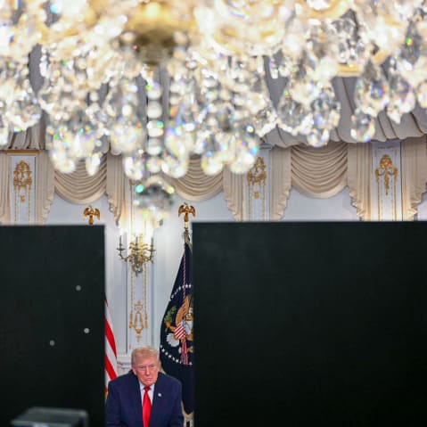 President Donald Trump participates in a video call with military service members from his Mar-a-Lago residence in Palm Beach, Florida, on Nov.27, 2025.