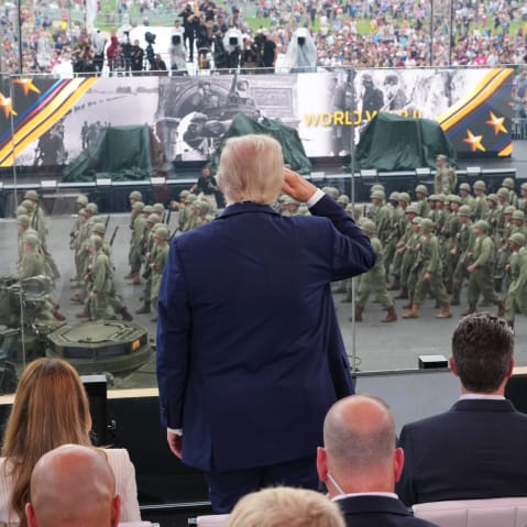 President Donald Trump salutes Army troops on the National Mall.