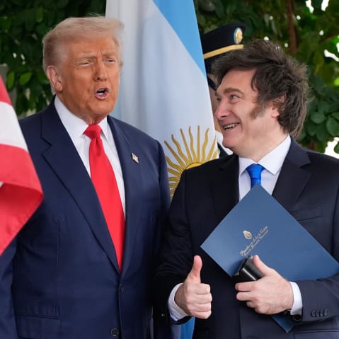 President Donald Trump greets Argentina's President Javier Milei at the White House on Oct. 14, 2025.