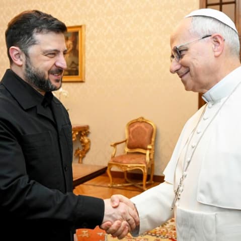 President of Ukraine Volodymyr Zelenskyy and Pope Leo XIV shaking hands in Castel Gandolfo, Italy.