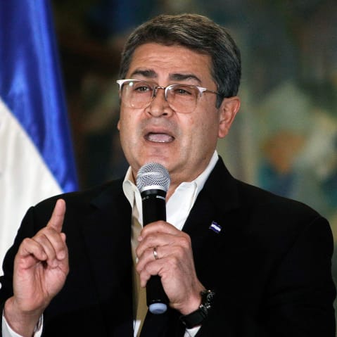 Juan Orlando Hernández speaks during a press conference.