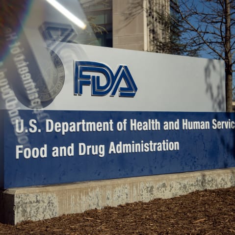 A sign for the U.S. Food and Drug Administration in Silver Spring, M.D., as seen through a prism on April 8, 2025.