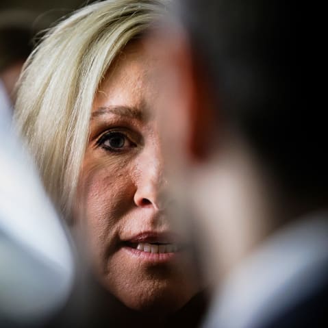 A close up of Marjorie Taylor Greene talking to reporters following a House GOP caucus meeting at the Capitol on April 10, 2024.