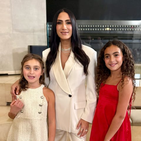 Mandana Dayani poses with her daughters after being sworn in as a trustee to the U.S. Holocaust Memorial Council on Dec. 8.
