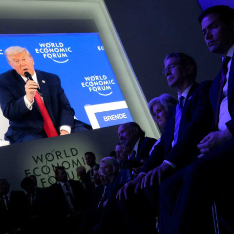 Donald Trump shown on a screen at the World Economic Forum in Davos