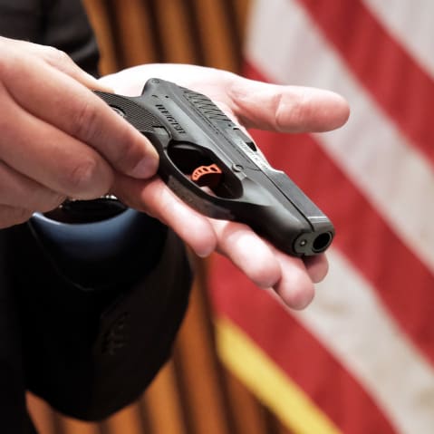 Guns confiscated at New York City public schools at a news conference on May 25, 2022, in New York City.