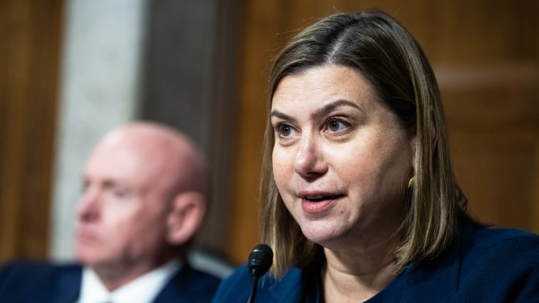 Sen. Elissa Slotkin, with Sen. Mark Kelly in the background.