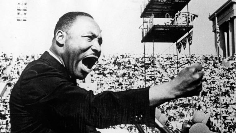 American civil rights and religious leader Dr. Martin Luther King Jr. (1929 - 1968) gestures emphatically during a speech at a Chicago Freedom Movement rally in Soldier Field, Chicago, Illinois, July 10, 1966.