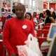 Employees ring customers up at cash registers inside a Target store in Jersey City, N.J.