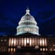 The Capitol dome at night.