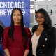 Mika Brzezinski, Liz Dozier, and Tatyana Ali in front of a Chicago Beyond sign.
