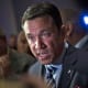 Former Rep. Michael Grimm speaks to reporters after conceding the race during a primary election night event on June 26, 2018 in the Staten Island borough of New York City.