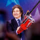 Javier Milei holding a chainsaw.