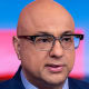 Ali Velshi; Prop 50 sign.