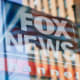 Reflection of "FOX NEWS" sign on the The News Corp. building in NYC.
