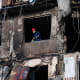 First responders operate at one of the buildings damaged by Russia's drone attack in Kyiv, Ukraine.