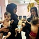 Mothers hold their emaciated children at Nasser Hospital in Khan Yunis, Gaza