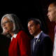 Katherine Clark speaks with Pete Aguilar and Hakeem Jeffries standing behind her during a news conference.