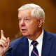 Lindsey Graham points as he speaks during a hearing.