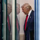 President Donald Trump arrives for a news conference