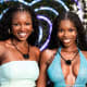 Michelle "Chelley" Bissainthe, left, and Olandria Carthen pose together while smiling