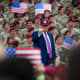 President Donald Trump leaves the stage after speaking at a rally with U.S. Army troops on June 10, 2025 at Fort Bragg, N.C.