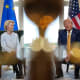 From left, Ursula von der Leyen, and Donald Trump sit inside of a room