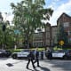 Police and first responders work at the scene of a shooting near Annunciation Church and Catholic School in Minneapolis, Minneosta, on August 27, 2025.