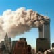 Image: Smoke pours from the twin towers of the World Trade Center after they were hit by two hijacked airliners in a terrorist attack Sept.11, 2001 in New York City.