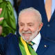 Luiz Inacio Lula da Silva smiles as he waves