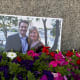 A photograph of Melissa Hortman and her husband amongst flowers