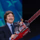 Javier Milei holding a chainsaw