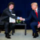 U.S. President Donald Trump (R) shakes hands with President of Argentina Javier Milei.